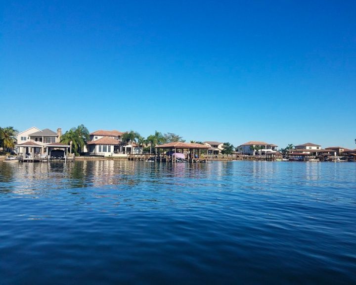 Houses along a body of water in Conway, Orlando, Florida