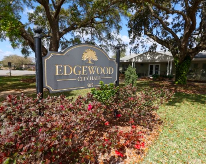 A sign displaying Edgwood Estates in Tampa, Florida, showcasing the service areas.